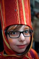 Binche festival carnival in Belgium Brussels. Girl dressed with costume. Children and teenagers dressed with costumes. Music, dance, party and costumes in Binche Carnival. Ancient and representative cultural event of Wallonia, Belgium. The carnival of Binche is an event that takes place each year in the Belgian town of Binche during the Sunday, Monday, and Tuesday preceding Ash Wednesday. The carnival is the best known of several that take place in Belgium at the same time and has been proclaimed as a Masterpiece of the Oral and Intangible Heritage of Humanity listed by UNESCO. Its history dates back to approximately the 14th century.